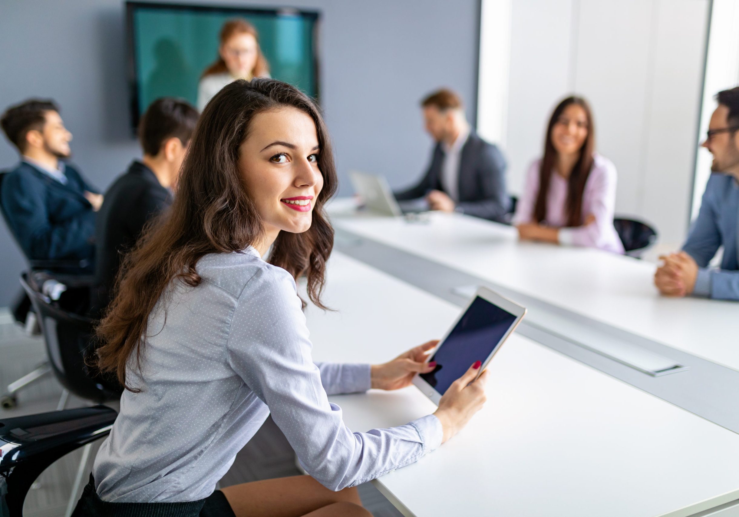 Business,People,Discussing,Documents,And,Ideas,At,Meeting